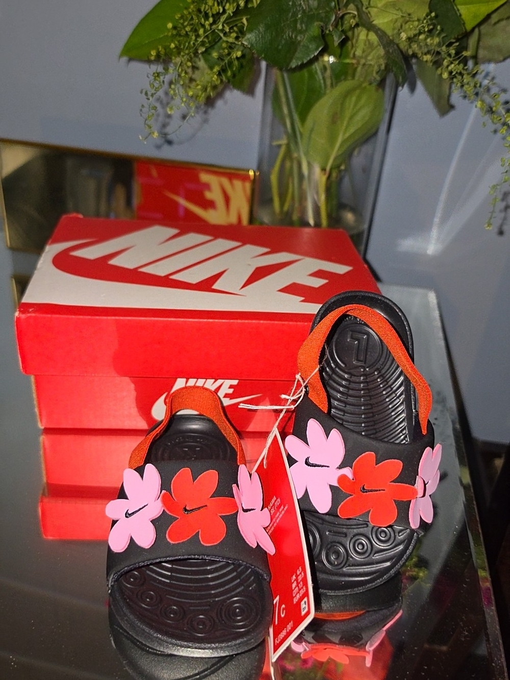 Nike Women’s Black Slide Sandals with Pink & Orange Floral Accents